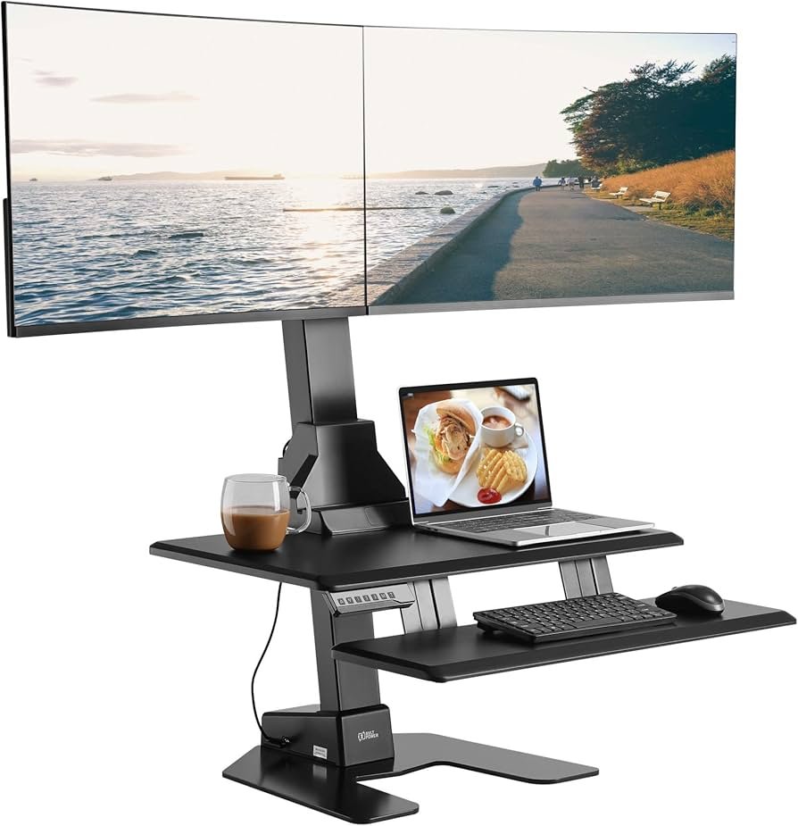 adjustable desk converter sitting on existing desk workstation