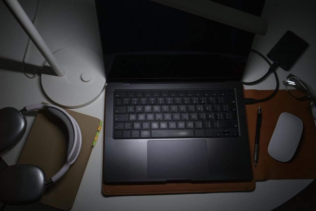 Adjustable LED desk lamp providing comfortable lighting for an ergonomic workspace