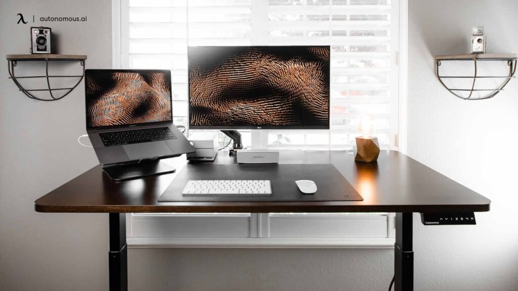 ergonomic home office desk setup with monitor chair and organized workspace
